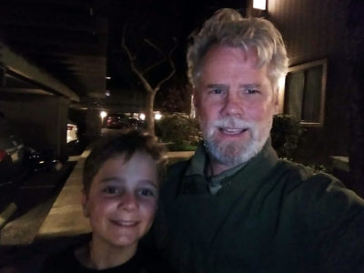 Knocking doors for Cool Block with my son Jake